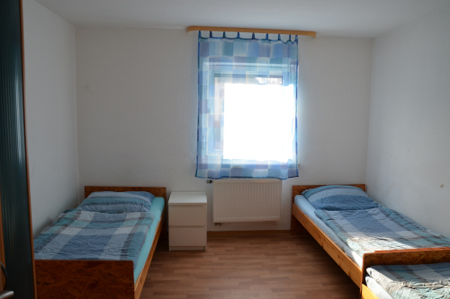 1. Ferienwohnung Laubach - Schlafzimmer